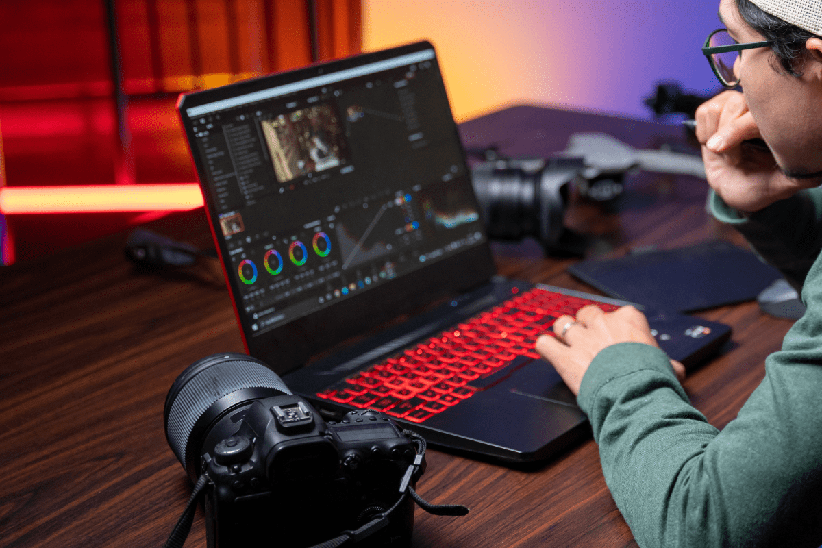 professional using a laptop at his workstation